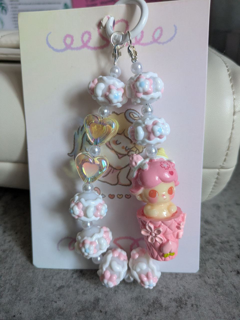 Rosa Dimoo Handykette & Taschenanhänger: Der süße kleine Anhänger