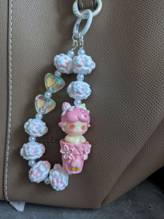 Rosa Dimoo Handykette & Taschenanhänger: Der süße kleine Anhänger