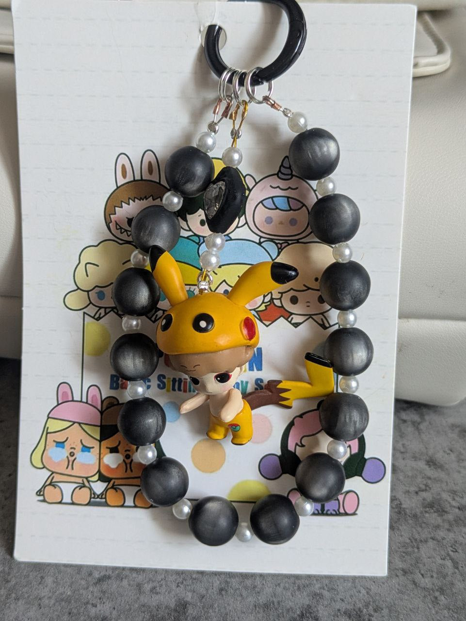 Pickatchu Dimoo Design Handykette & Taschenanhänger: Der süße kleine Anhänger